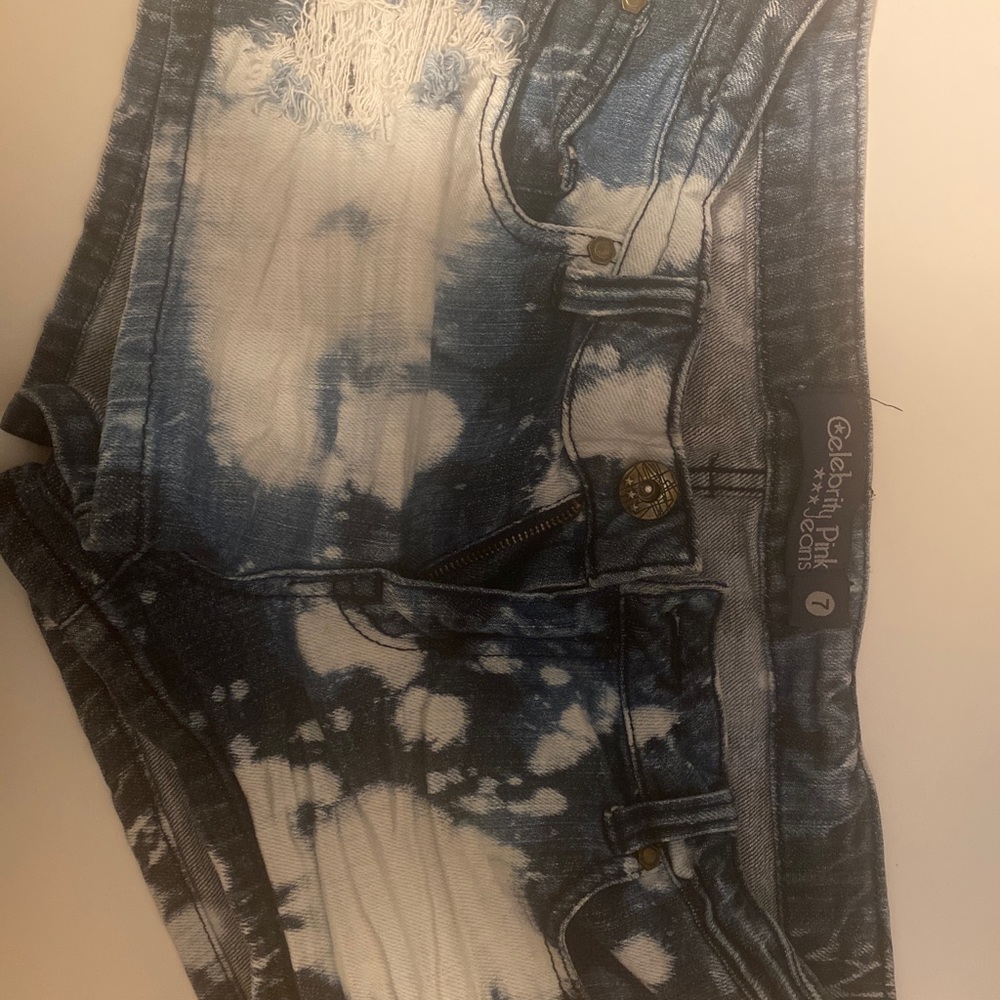 Celebrity pink shirt jeans